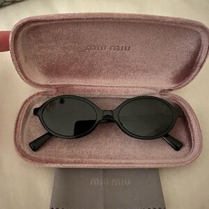 Miu Miu Black Oval Sunglasses